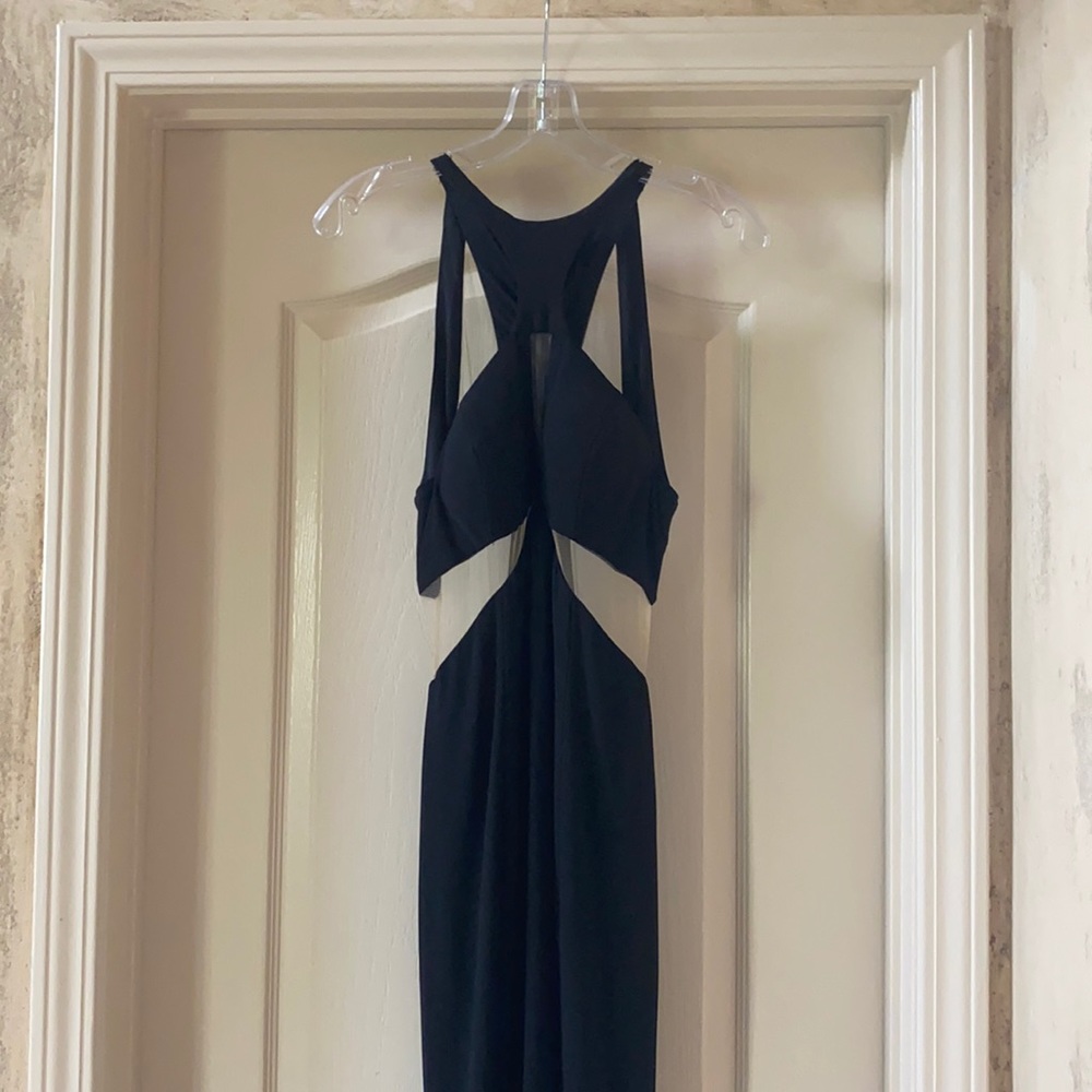 Beautiful prom or wedding guest dress. Cut out with mesh on the sides.